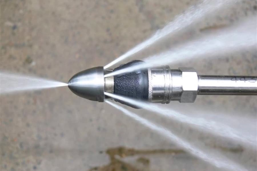 Hydro-jetting nozzle using high-pressure water for sewer and pipeline cleaning
